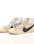 Nike x Off-White Blazer shoes in white with black accents, featuring unique design details and branding elements.