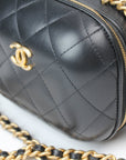 Chanel Matelassé Vanity Shoulder Bag in elegant quilted leather with a gold chain strap, showcasing a stylish design.
