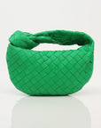 Bottega Veneta Mini Jodie Bag in soft leather with a unique woven design and a compact silhouette for stylish carrying.