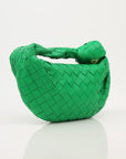 Bottega Veneta Mini Jodie Bag in soft leather with a unique woven design and a stylish shoulder strap.