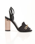 Black satin Burberry Coleford heels with gold chain detail, size 36, by Gold & Beyond, showing the elegant shoe side view.