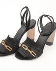 Burberry Coleford black satin heels with gold chain detail, size 36, by Gold & Beyond, shown from side angle.