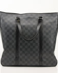 Louis Vuitton Tada Tote travel bag by Gold & Beyond, showcasing sleek design and spacious interior for stylish travel accessories.
