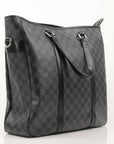 Louis Vuitton Tada Tote travel bag by Gold & Beyond, featuring sleek design, sturdy handles, and spacious interior for travel needs.