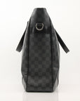Louis Vuitton Tada Tote travel bag by Gold & Beyond, showcasing sleek design with leather handles and spacious interior.