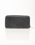 Yves Saint Laurent Chevron Wallet in black leather with chevron pattern and gold accents, showcasing elegant design features.