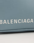Gold & Beyond Balenciaga Triangle Pouch handbag with sleek design and signature geometric logo on a neutral background.
