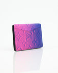 Louis Vuitton Pocket Organizer wallet in gradient monogram leather, showcasing its elegant design and compact size.