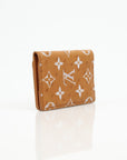 Louis Vuitton Pocket Organizer wallet in Monogram leather with multiple card slots and a sleek design.