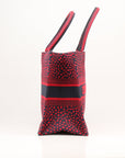 Christian Dior Book Tote handbag featuring intricate heart embroidery in a stylish design by Gold & Beyond.