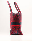 Christian Dior Book Tote handbag featuring intricate heart embroidery, showcasing a stylish and elegant design.