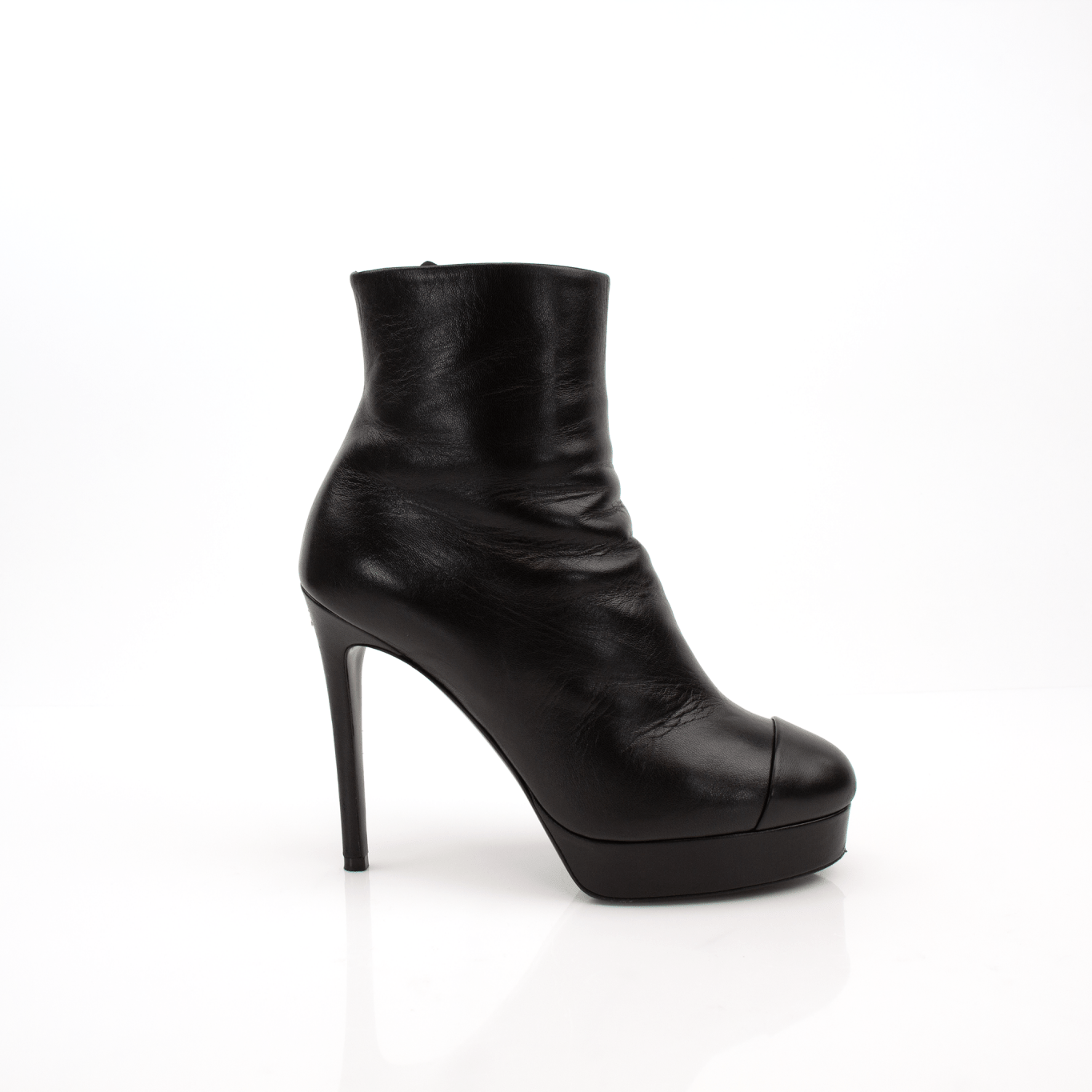 Gold & Beyond Chanel patent leather heels, stylish women's shoes with sleek glossy finish and classic design.