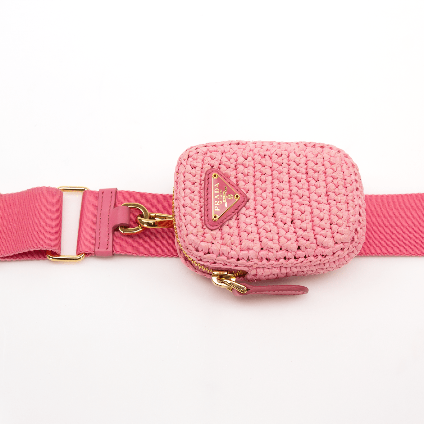 Pink Prada 2005 Re-Edition crochet handbag by Gold & Beyond, featuring intricate crochet patterns and a stylish, compact design.