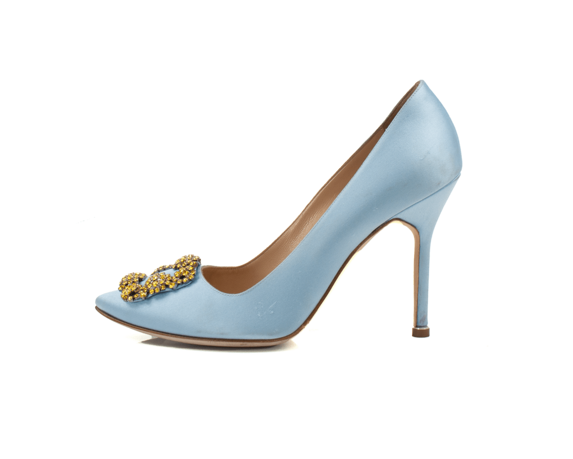 Manolo Blahnik crystal satin heels with elegant design and sparkling embellishments, showcased in a close-up image.
