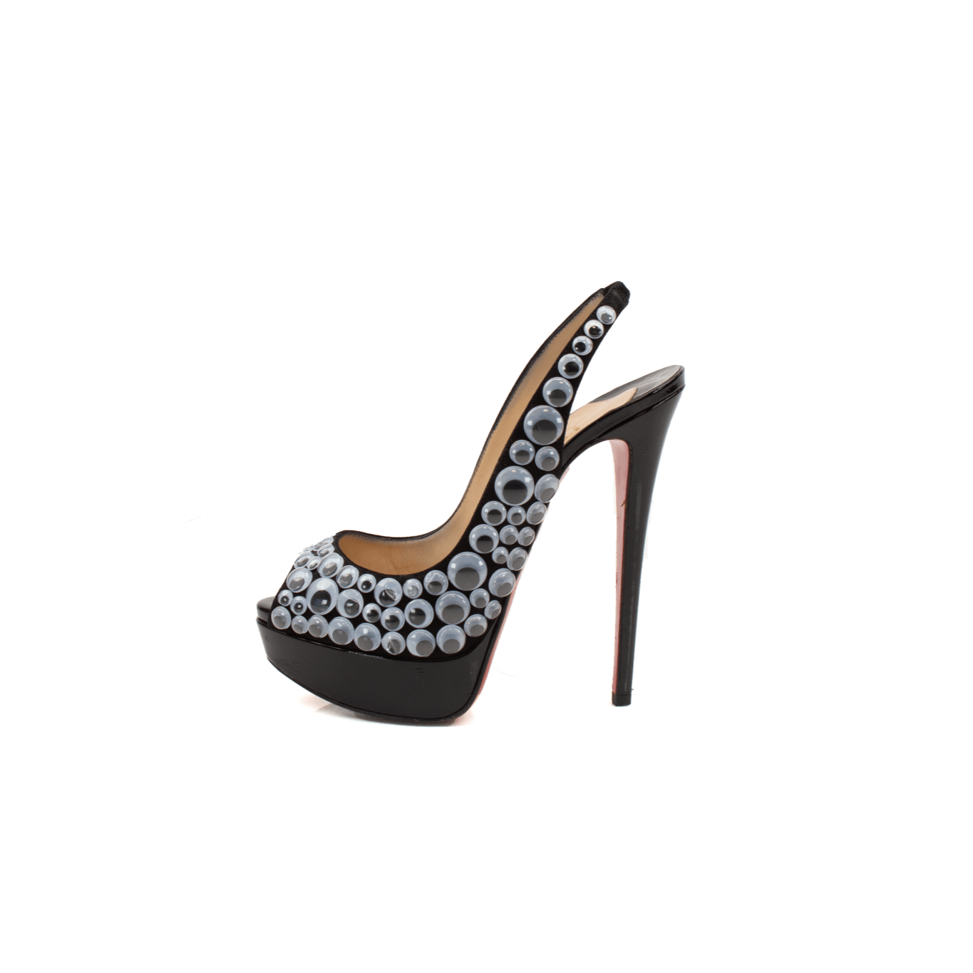 Christian Louboutin Deja Vu 150 platform heels with red soles and gold accents, displayed on a neutral background.