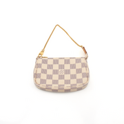 Louis Vuitton Mini Pochette wallet in monogram canvas with gold-tone hardware and a detachable chain strap.