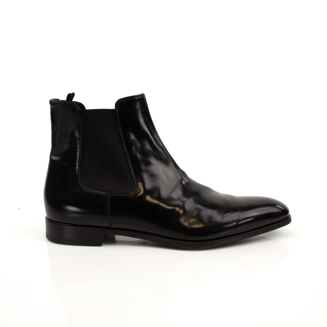 Gold & Beyond Prada men's Chelsea boots, stylish black leather shoes with elastic side panels and sleek design.
