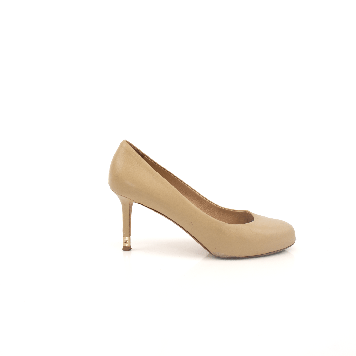 Chanel leather pumps in black with a sleek design and pointed toe, showcasing elegant craftsmanship by Gold & Beyond.