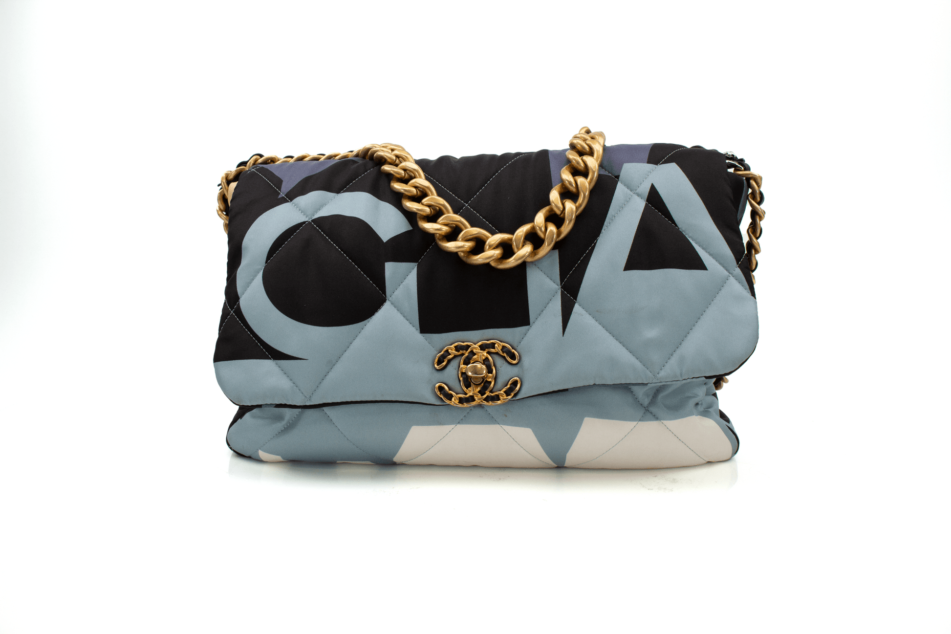 Chanel 19 silk flap handbag by Gold & Beyond in elegant design, showcasing intricate stitching and luxurious fabric.