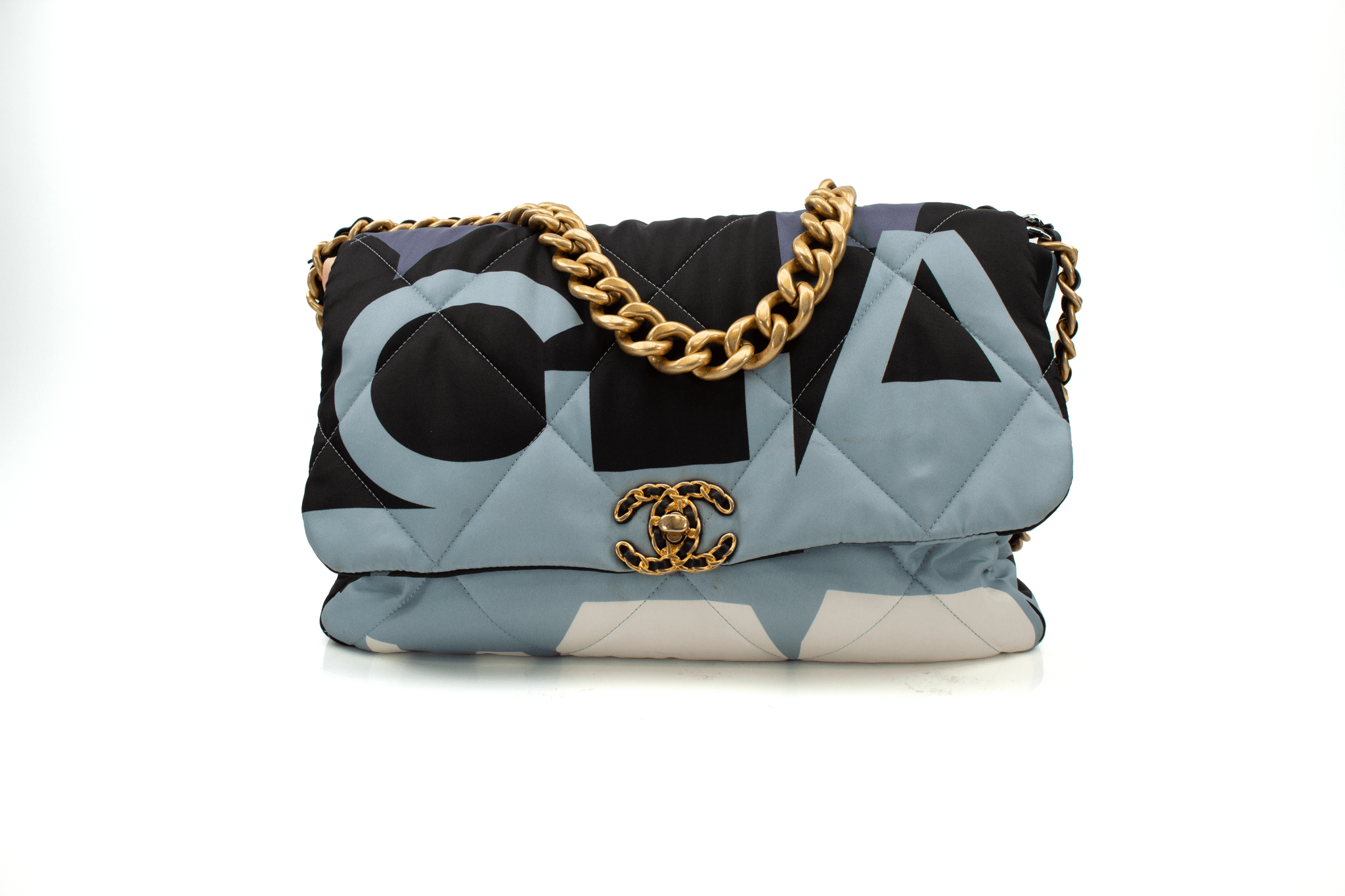 Chanel 19 silk flap handbag by Gold & Beyond in elegant design, showcasing intricate stitching and luxurious fabric.
