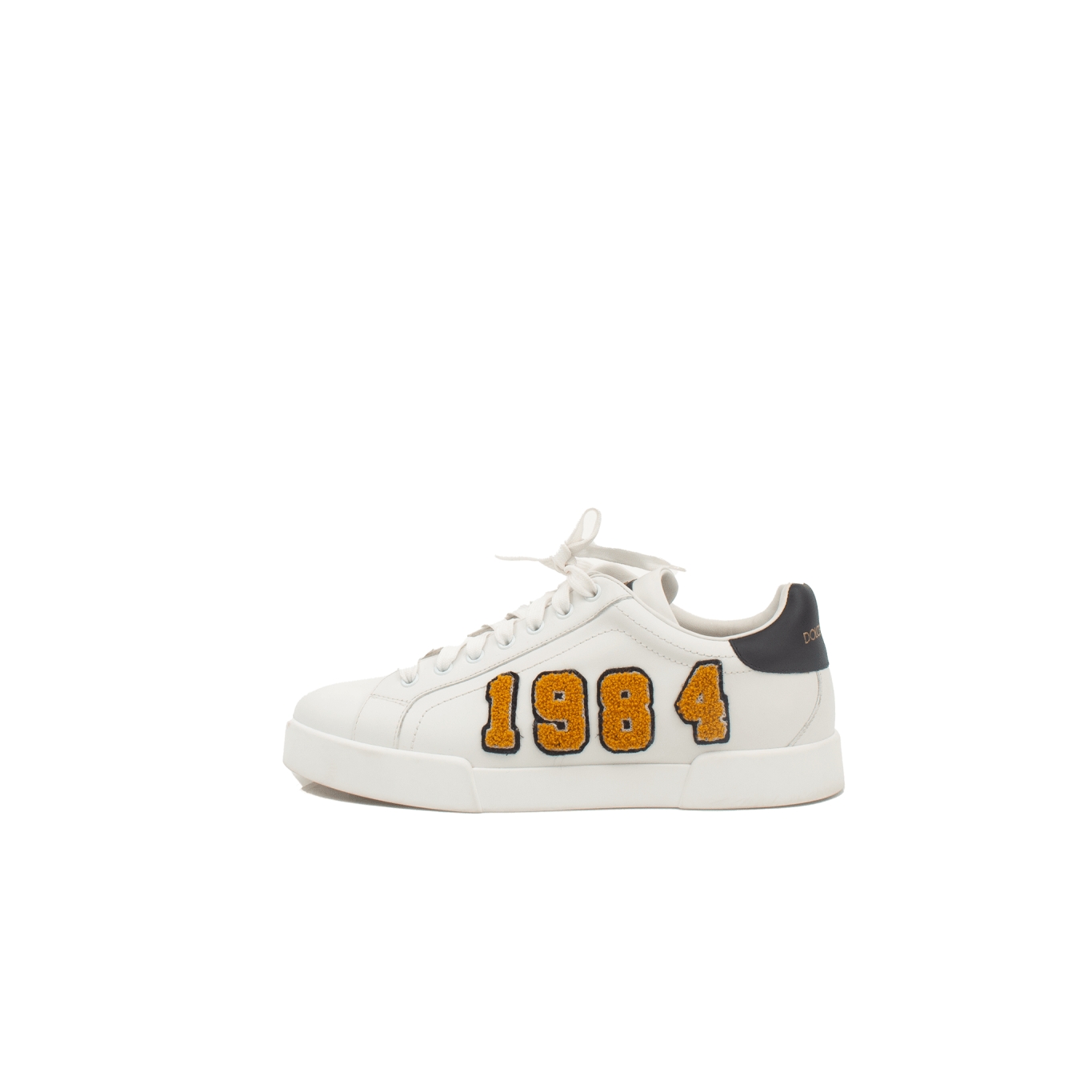 Gold & Beyond Dolce & Gabbana sneakers featuring stylish design, white soles, and branded details, perfect for casual wear.