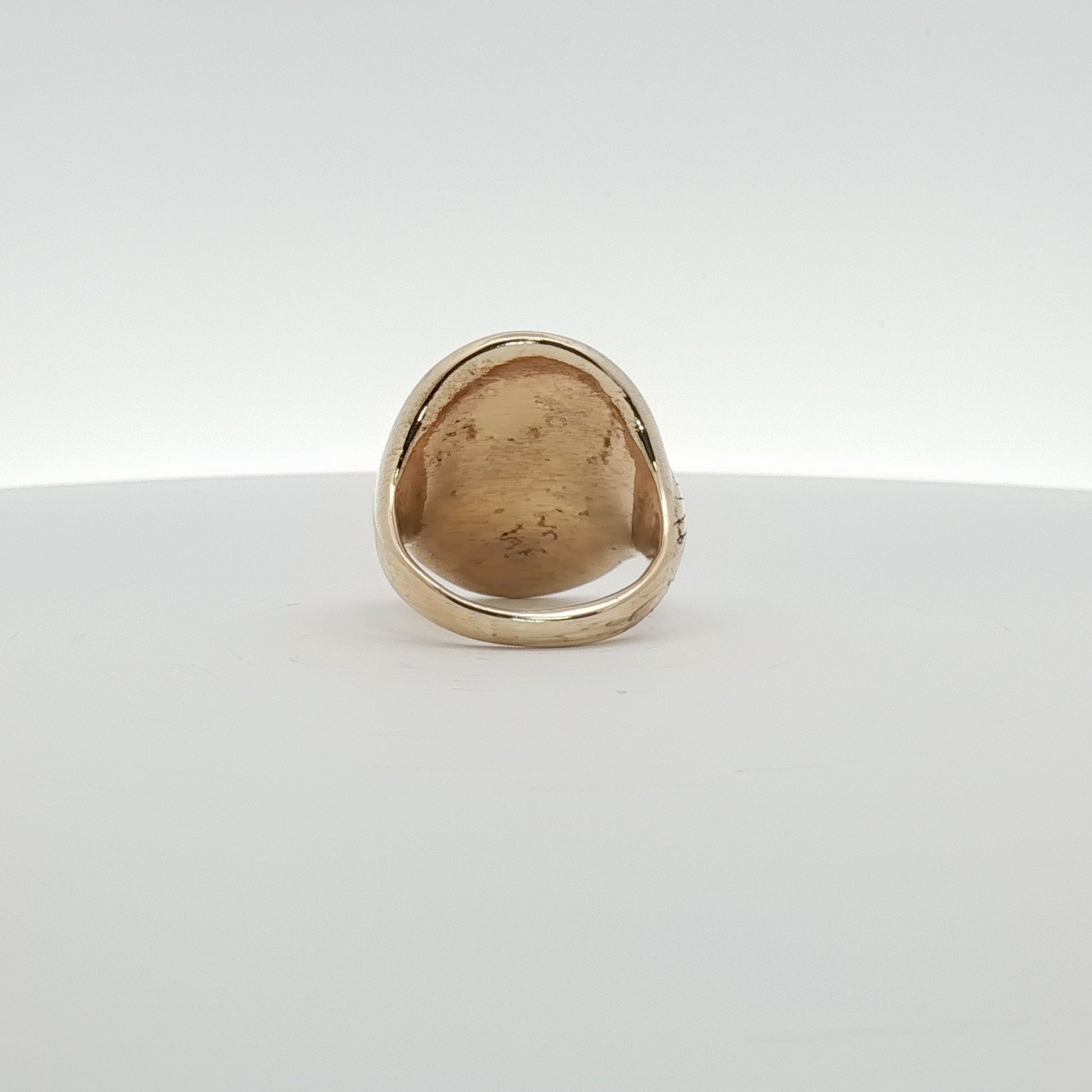 14K yellow gold cross coin ring featuring detailed religious design, crafted by Gold & Beyond, showcasing fine jewelry craftsmanship.