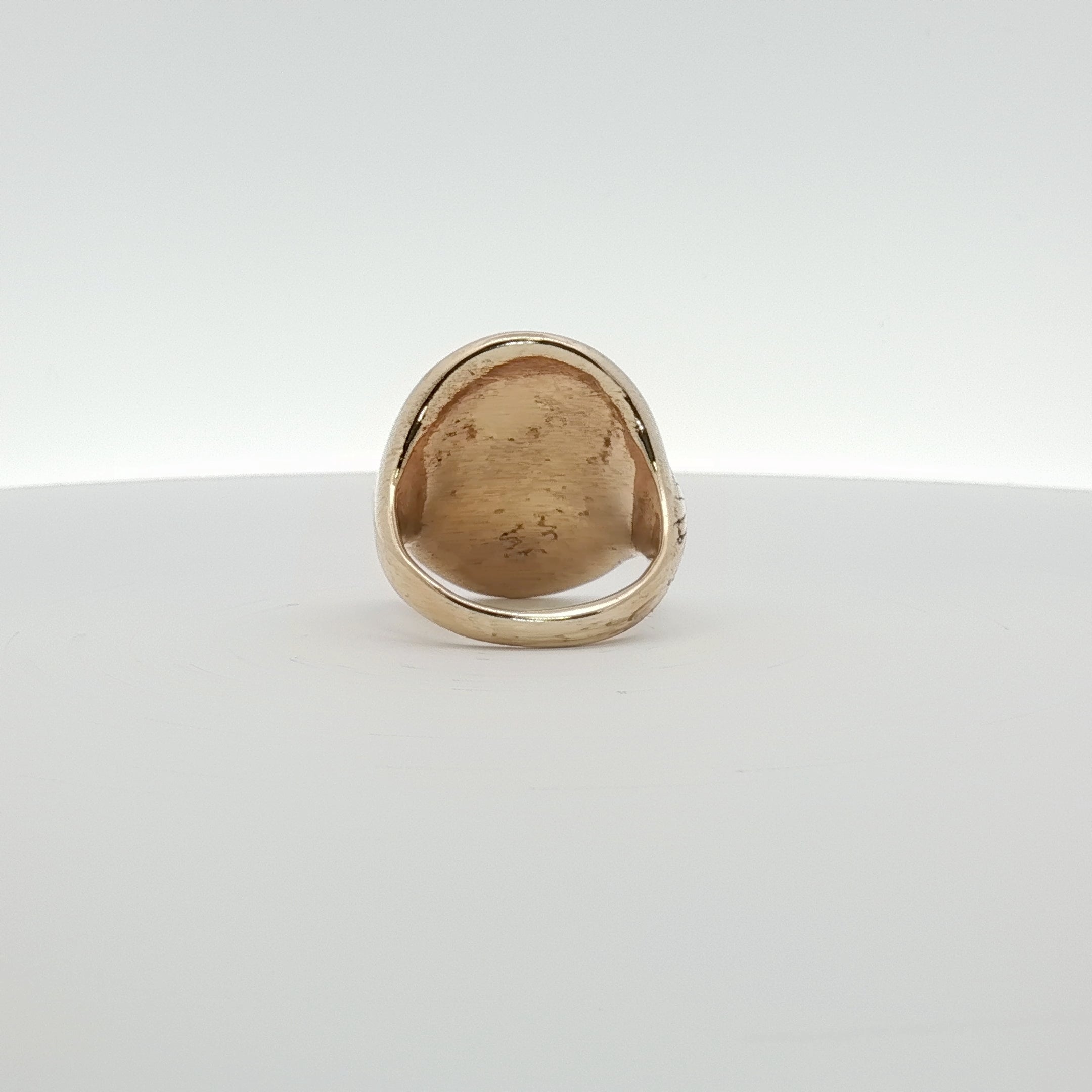 14K yellow gold cross coin ring featuring detailed religious design, crafted by Gold & Beyond, showcasing fine jewelry craftsmanship.