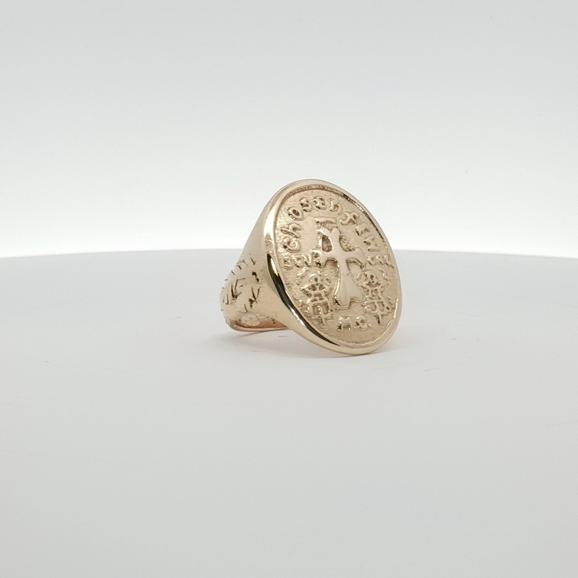 14K yellow gold cross coin ring featuring detailed religious design, crafted by Gold & Beyond in fine jewelry style.