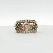 10K yellow gold emerald and diamond flower cluster ring, jewelry featuring vibrant green emeralds and sparkling diamonds.