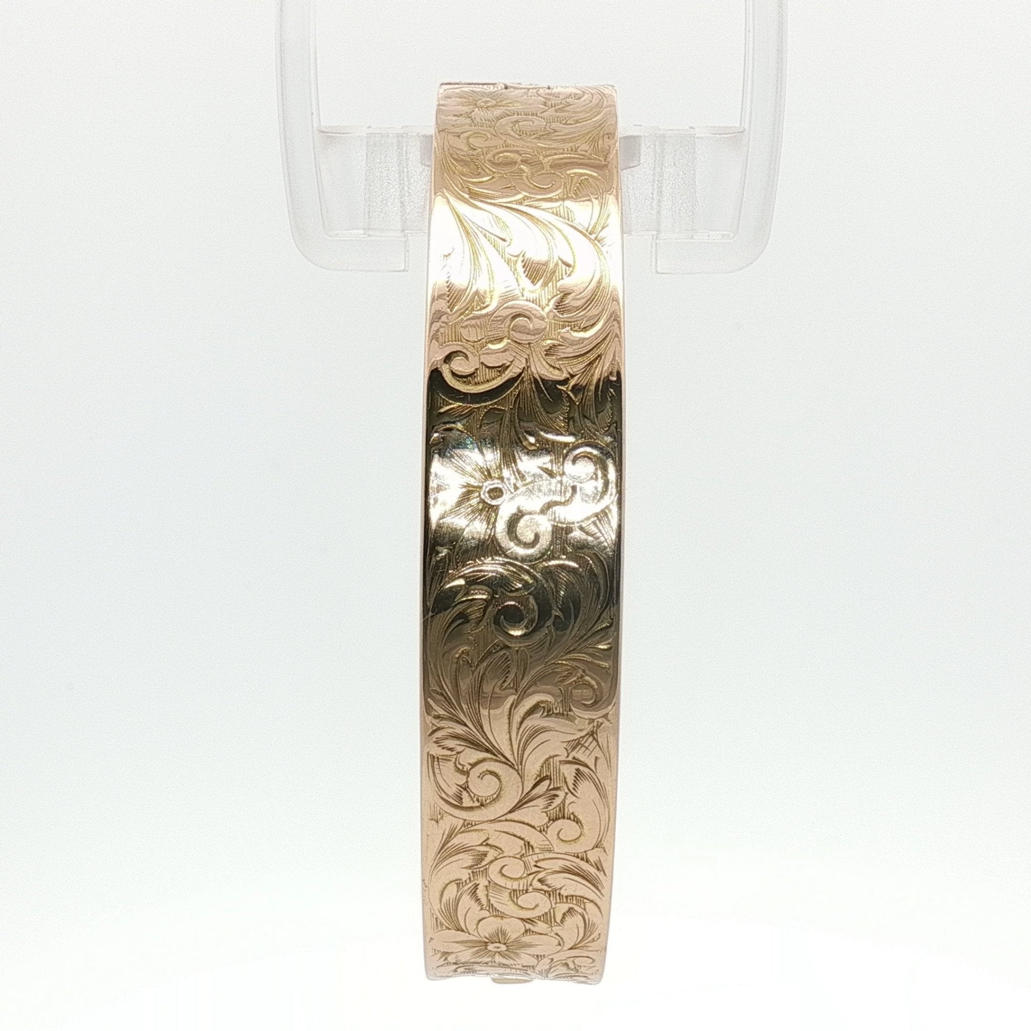 14K yellow gold engraved floral bangle bracelet with intricate floral design, elegant jewelry accessory from Gold & Beyond