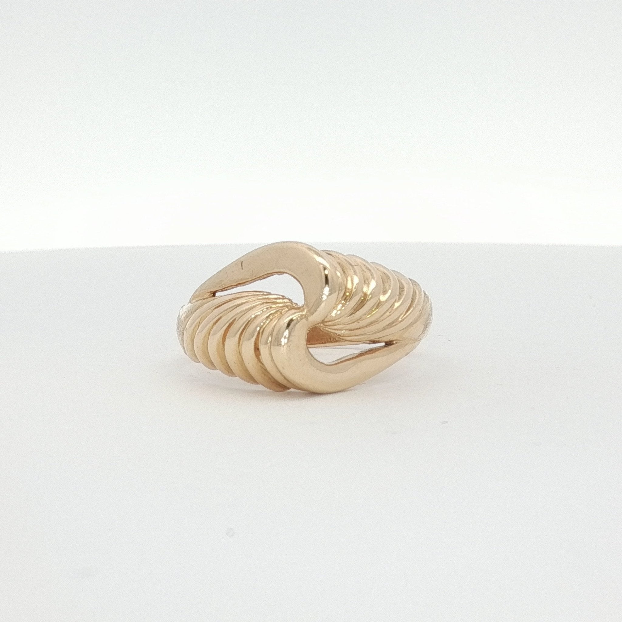 14K yellow gold swirl cluster ring with intricate design, jewelry piece featuring multiple gold swirls and a polished finish.