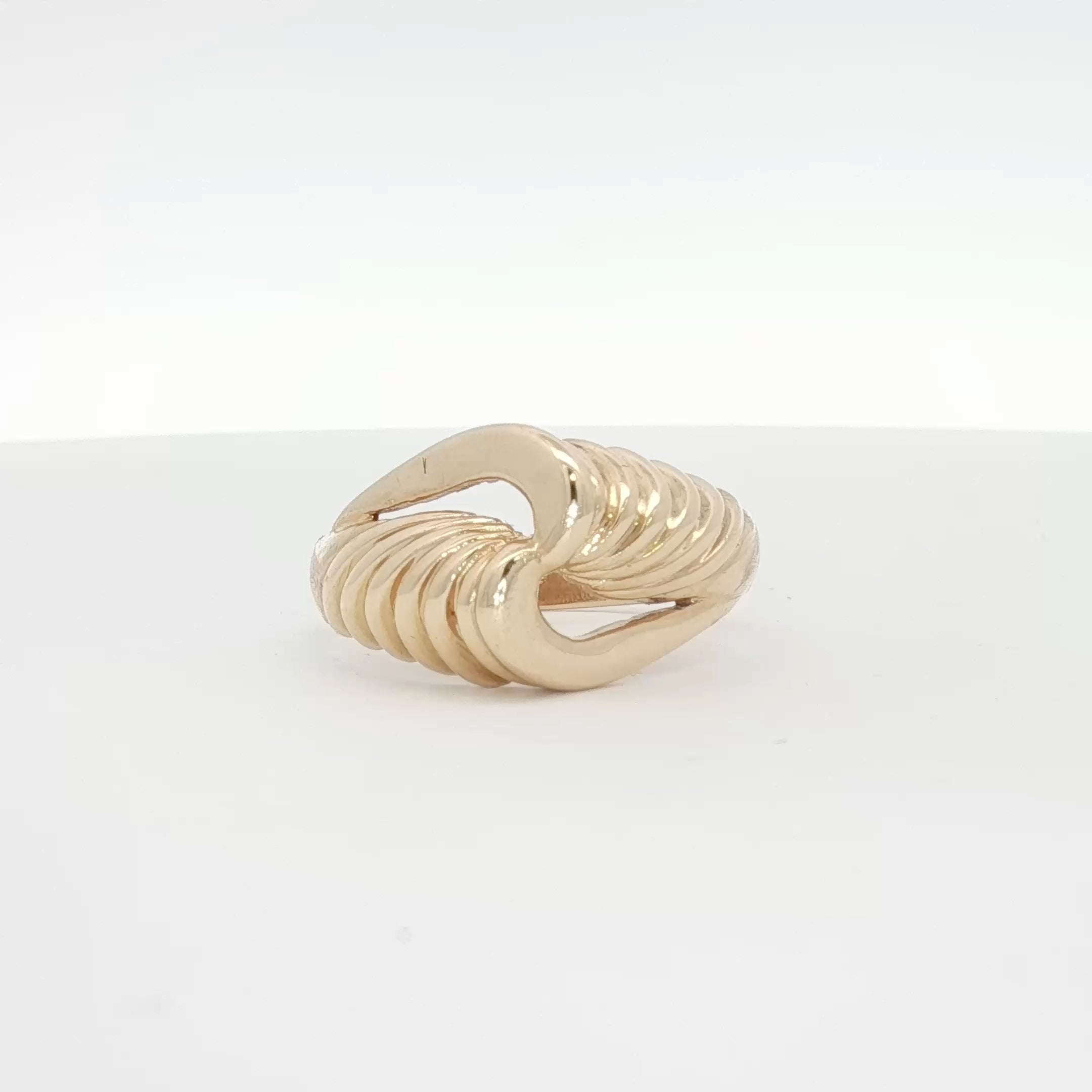 14K yellow gold swirl cluster ring with intricate design, showcasing sparkling gemstone accents, jewelry piece from Gold & Beyond