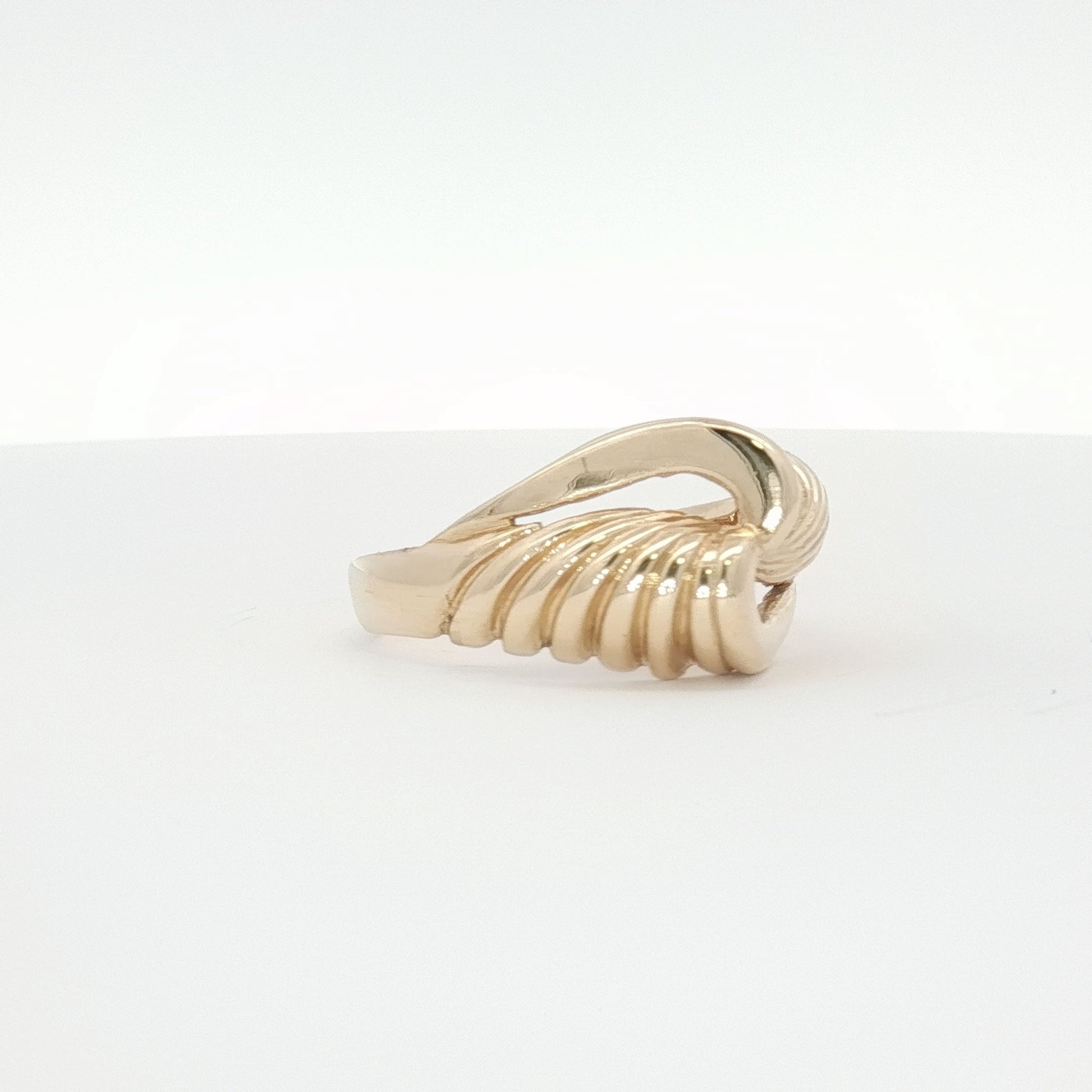 14K yellow gold swirl cluster ring with intricate design, showcasing elegant jewelry craftsmanship by Gold & Beyond.
