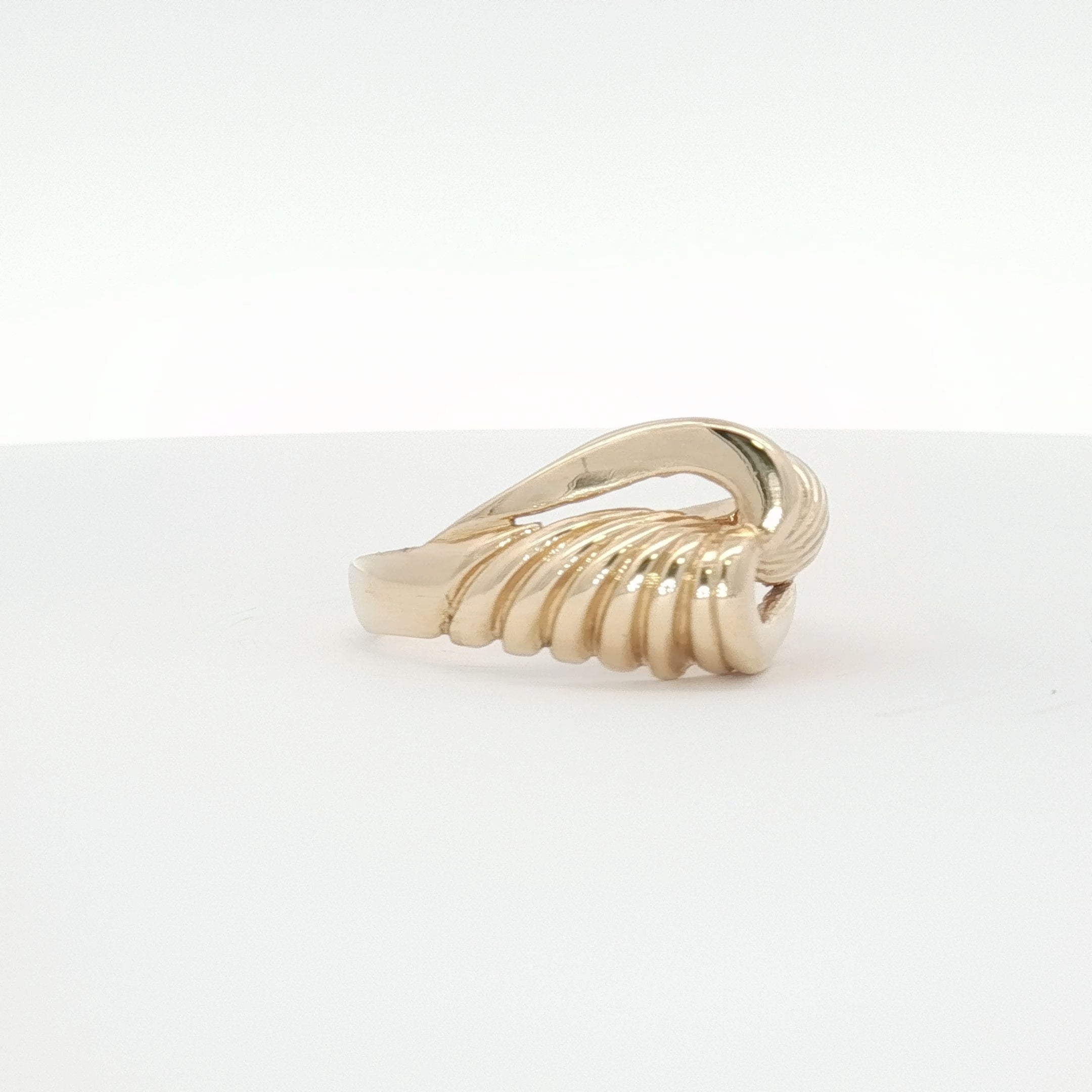 14K yellow gold swirl cluster ring with intricate design, showcasing elegant jewelry craftsmanship by Gold & Beyond.