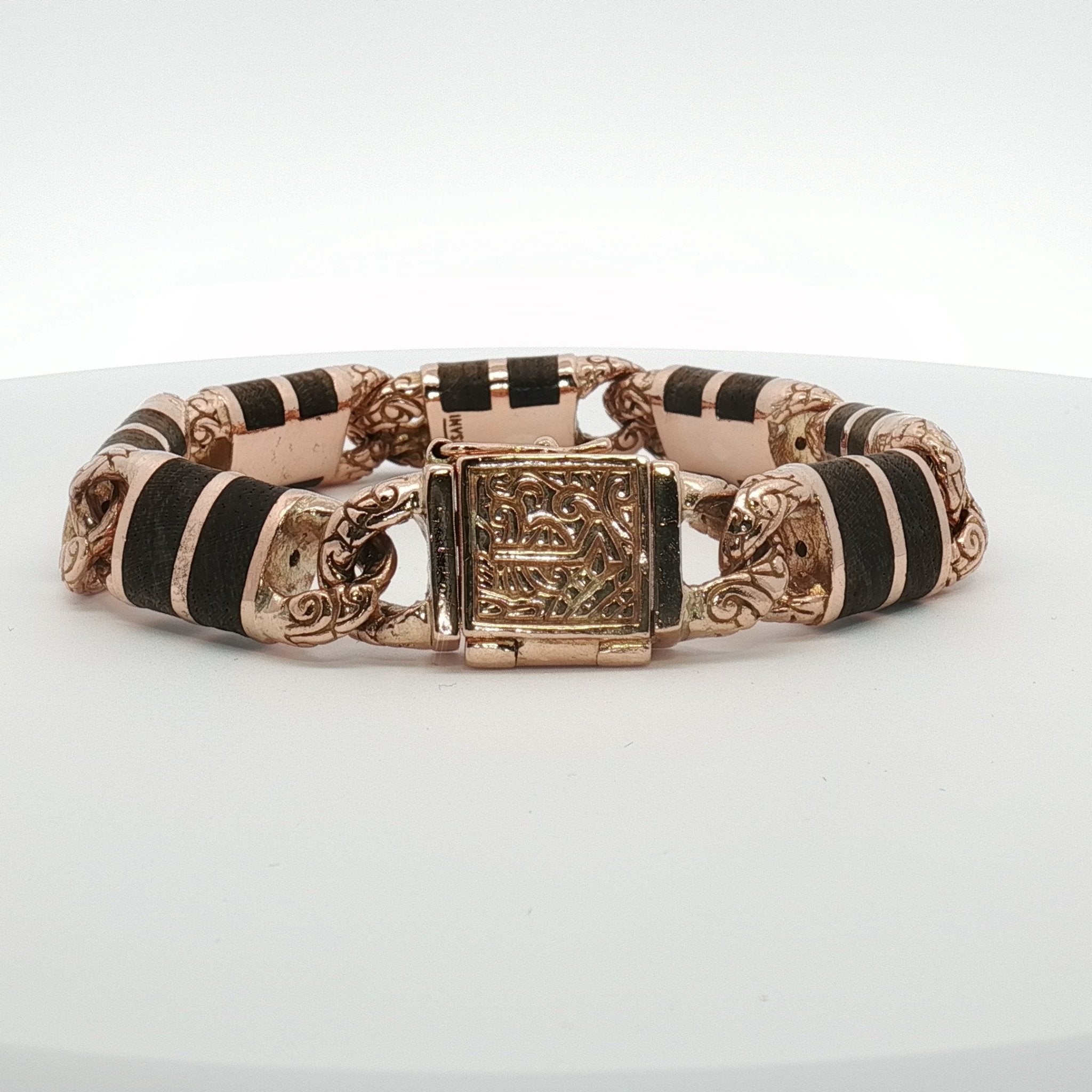 14K two-tone gold Versani bracelet featuring intertwined gold and silver links, elegant jewelry piece by Gold & Beyond.