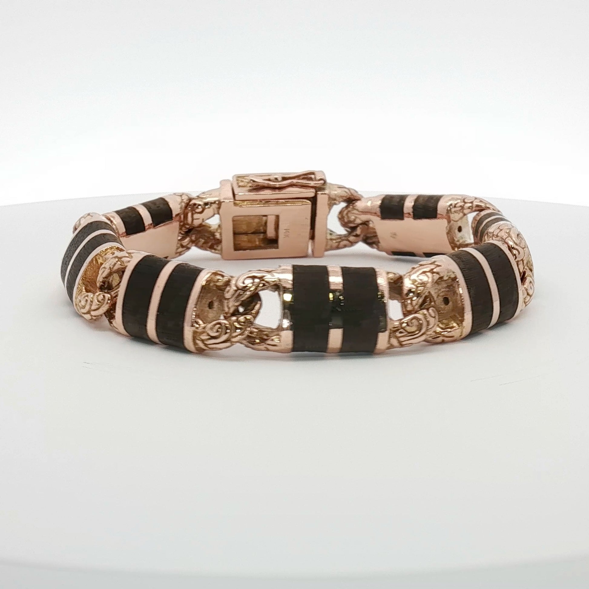 14K two-tone gold Versani bracelet featuring interwoven links, crafted by Gold & Beyond, elegant jewelry accessory.
