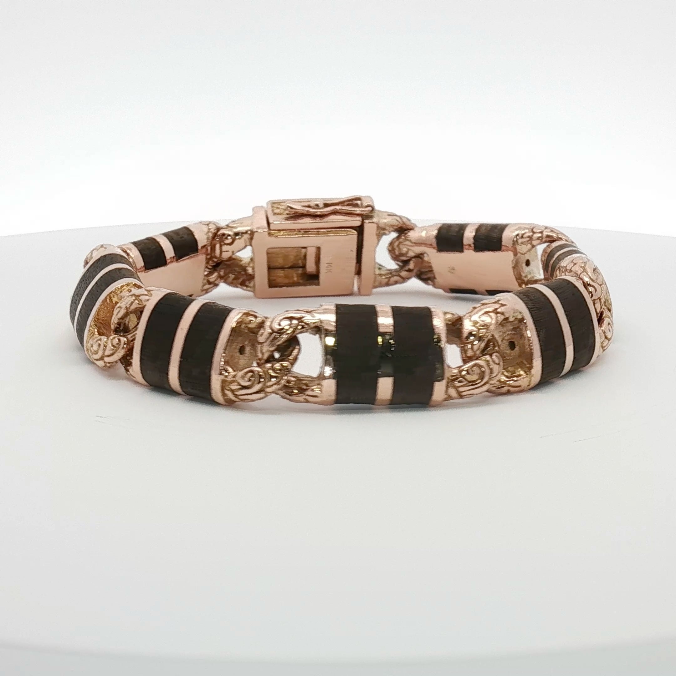 14K two-tone gold Versani bracelet featuring interwoven links, crafted by Gold & Beyond, elegant jewelry accessory.