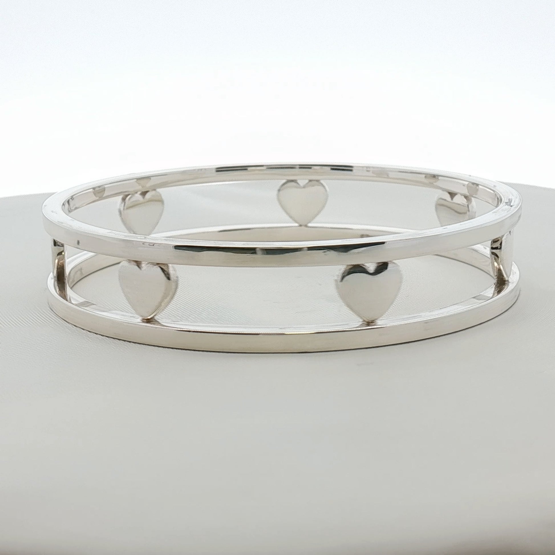 Sterling silver Tiffany & Co. heart bracelet from Gold & Beyond jewelry collection, featuring a delicate heart charm on a fine chain.