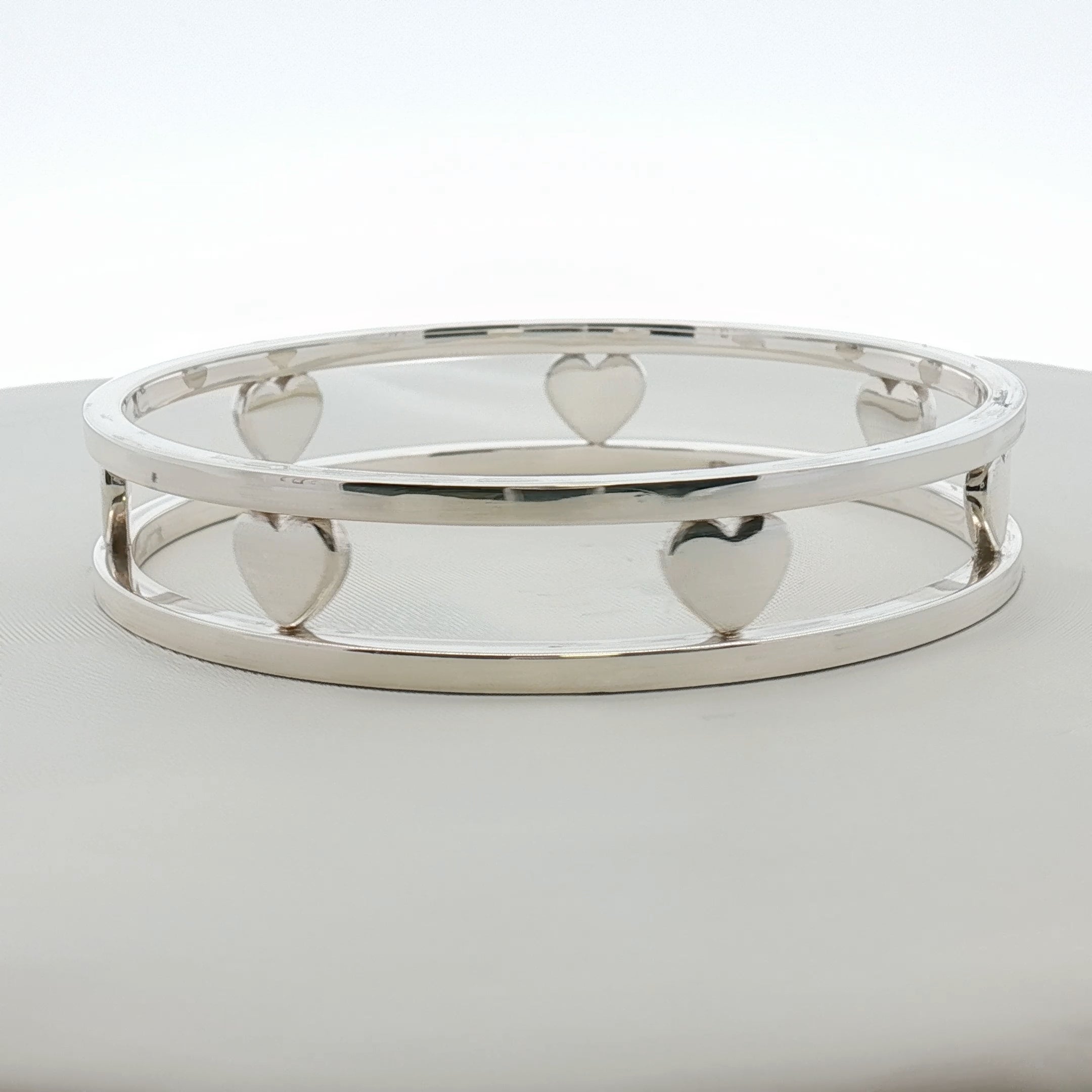 Sterling silver Tiffany & Co. heart bracelet from Gold & Beyond jewelry collection, featuring a delicate heart charm on a fine chain.