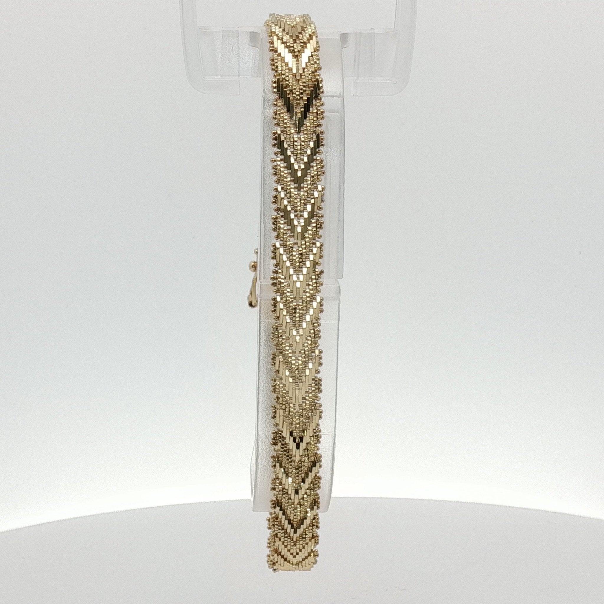 14K yellow gold textured link bracelet with interlocking chain design, jewelry piece from Gold & Beyond