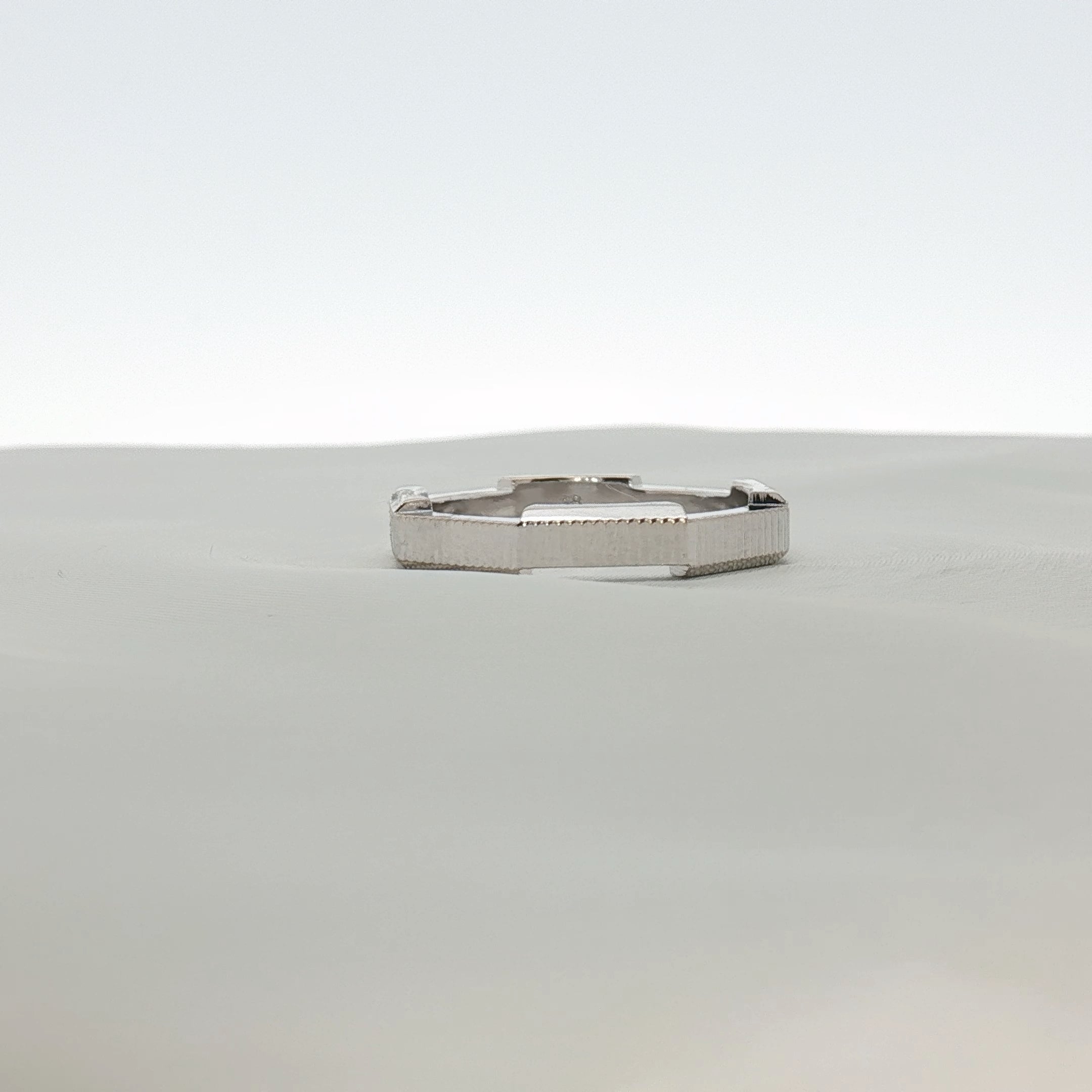 Gold & Beyond Gucci Link Band Ring jewelry with interconnected gold links, stylish and elegant accessory.