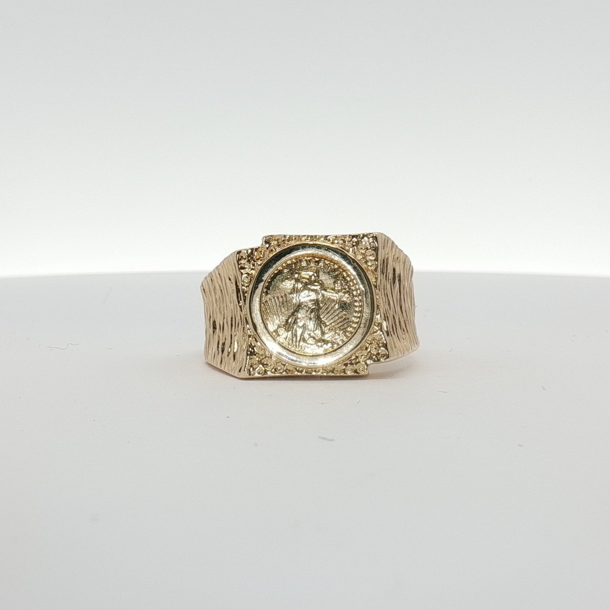 14K yellow gold coin ring from Gold & Beyond jewelry, featuring a detailed coin design on a smooth band.