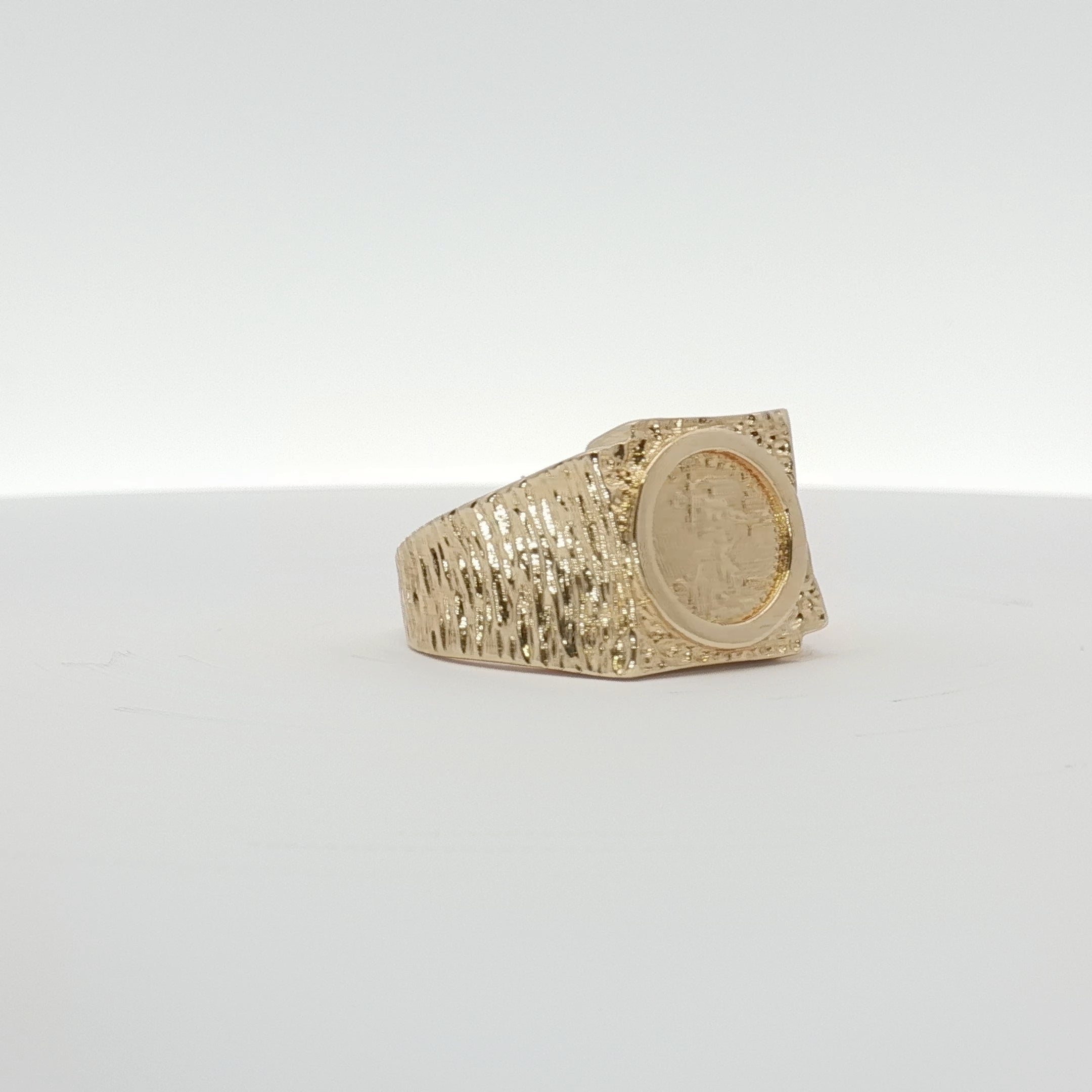 14K yellow gold coin ring with intricate design, showcasing a classic jewelry piece from Gold & Beyond.
