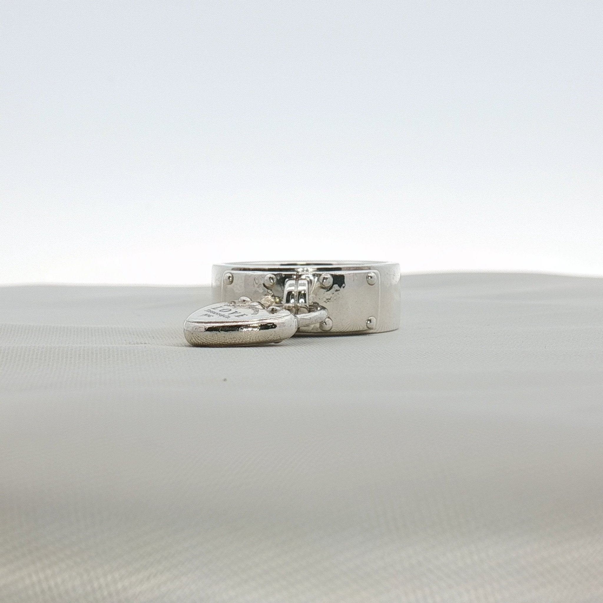 Sterling silver heart-shaped ring from Tiffany & Co. featuring a delicate jewelry design with a polished finish.