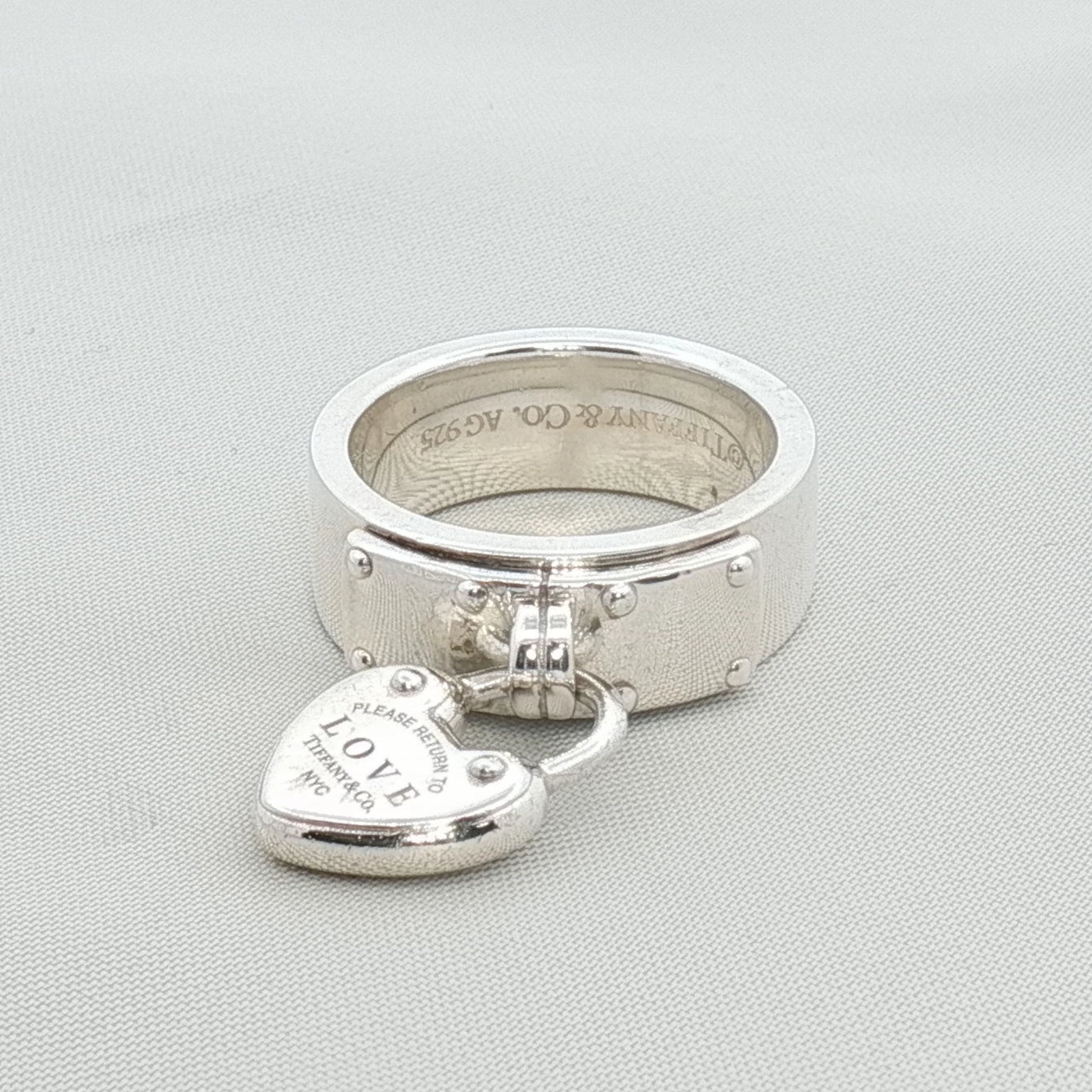Sterling silver Tiffany & Co. heart-shaped ring from Gold & Beyond jewelry collection, featuring a detailed heart design.