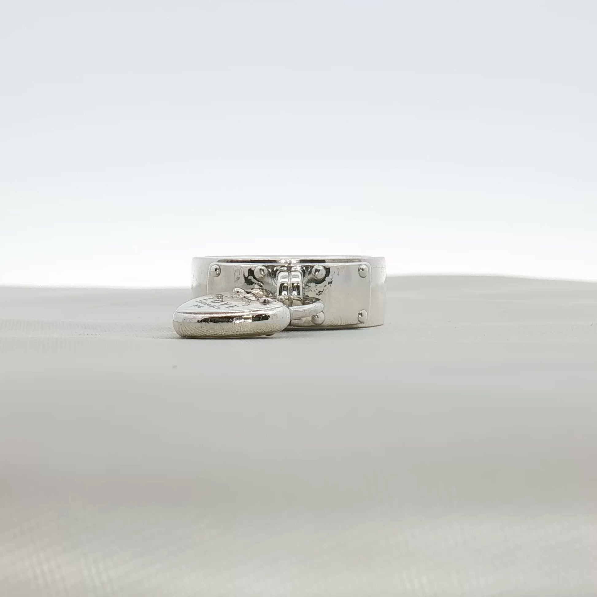 Sterling silver Tiffany & Co. heart-shaped ring with smooth finish, designed by Gold & Beyond, jewelry accessory.