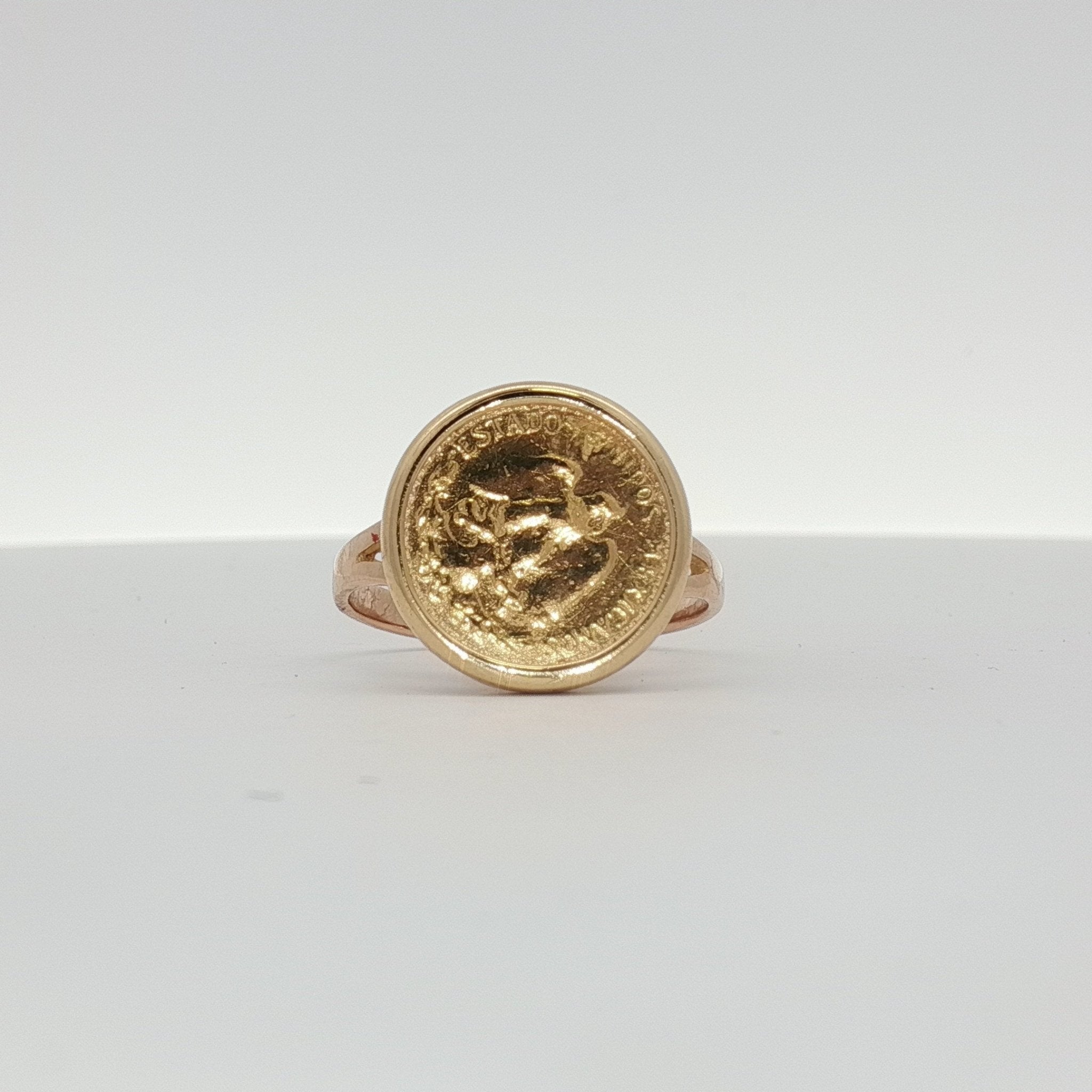 14K yellow gold coin ring with detailed engraved design, showcasing a classic jewelry piece from Gold & Beyond.