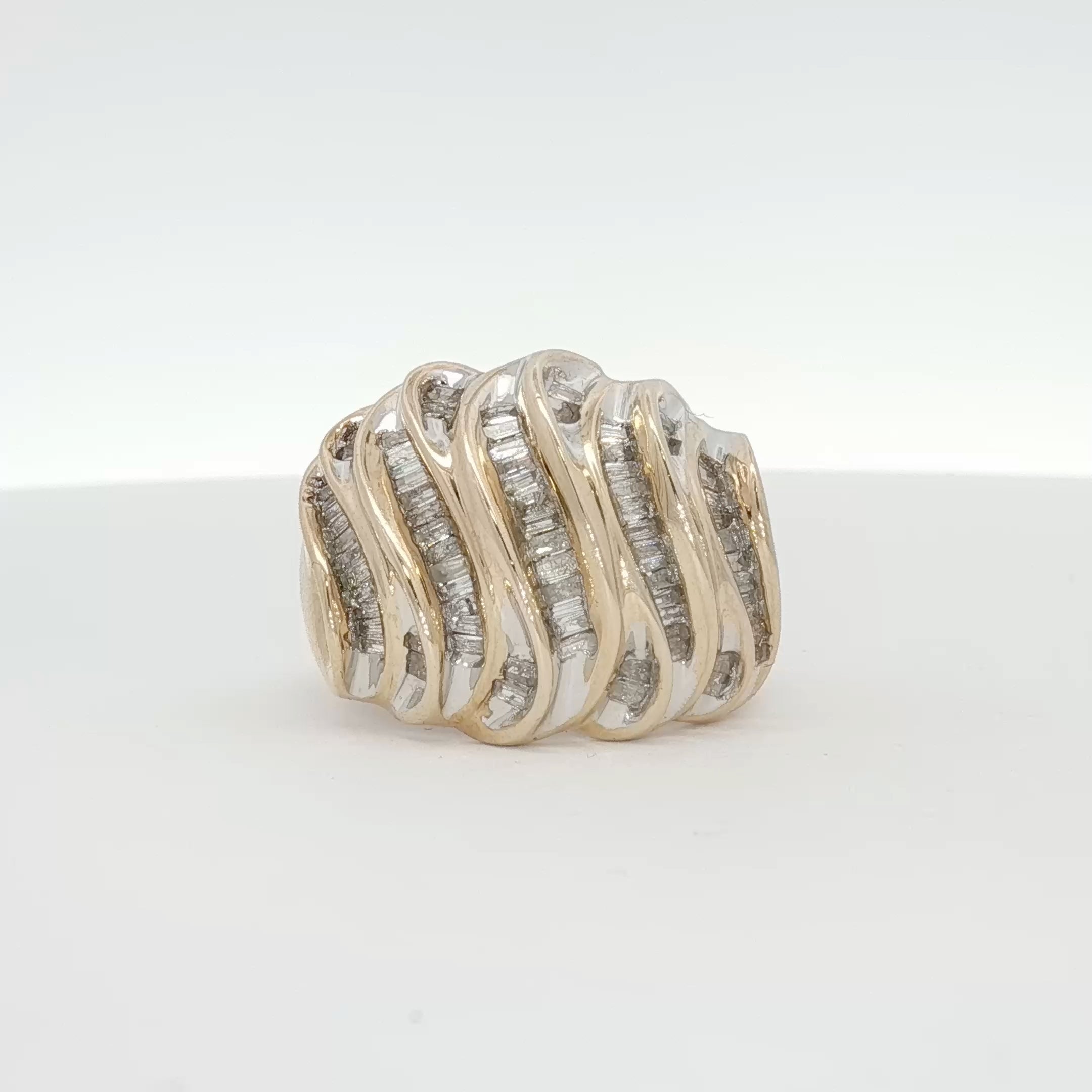 Yellow gold diamond wave cluster ring featuring a sparkling diamond design, crafted by Gold & Beyond.