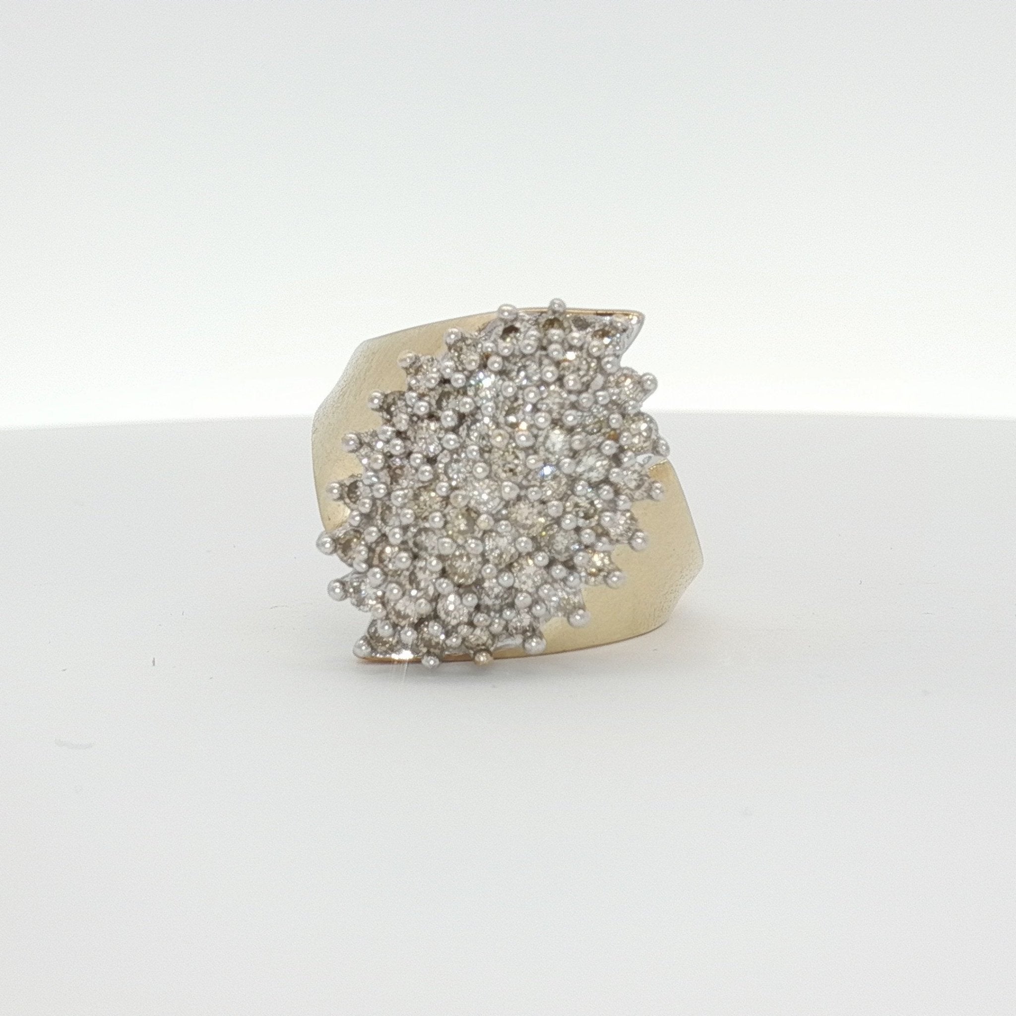 14K yellow gold diamond cluster ring showcasing a sparkling diamond design, elegant jewelry piece from Gold & Beyond