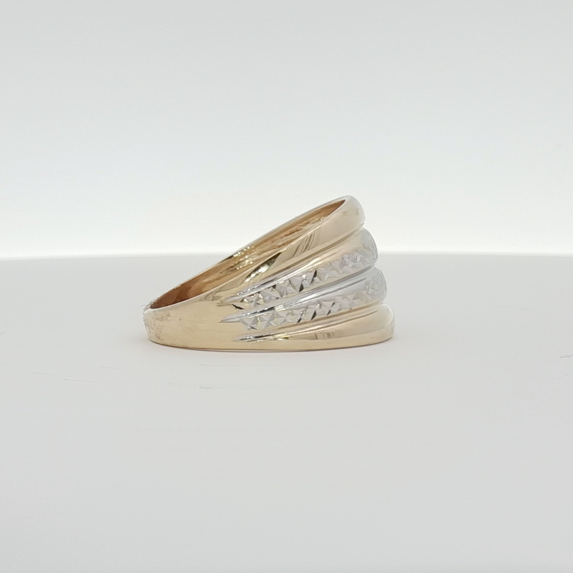 14K gold two-tone jewelry ring with mixed gold finishes, showcasing elegant design and craftsmanship.